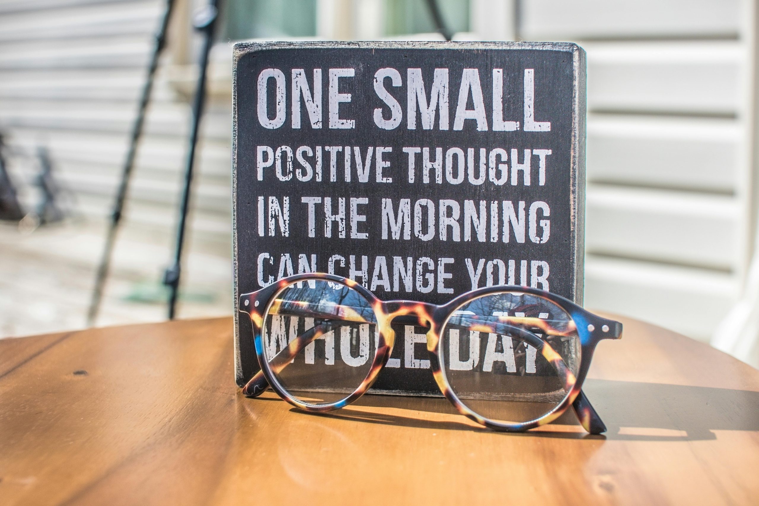Sign that says one small positive thought in the morning can change your whole day.
